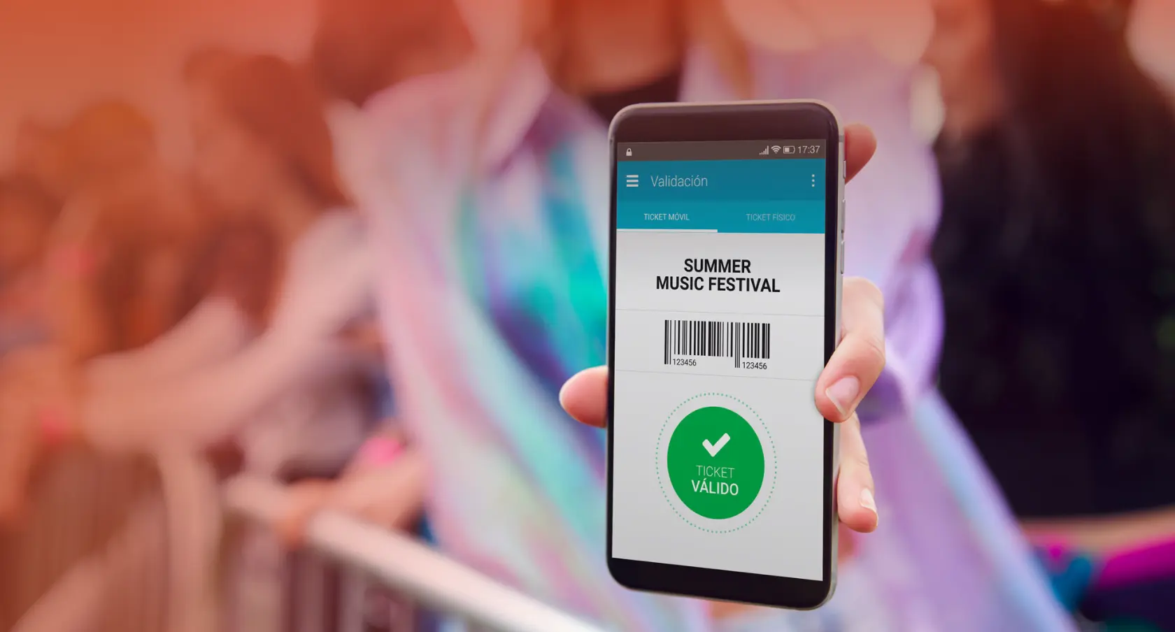 A person showcasing the Intellitickets product from their mobile device.